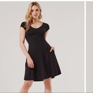 Pact Organic Cotton Fit and Flare Black dress with open back cut out